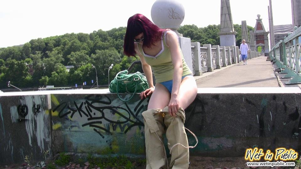 Red-haired gal wets her pants and takes a pissing tour around the city #78594781