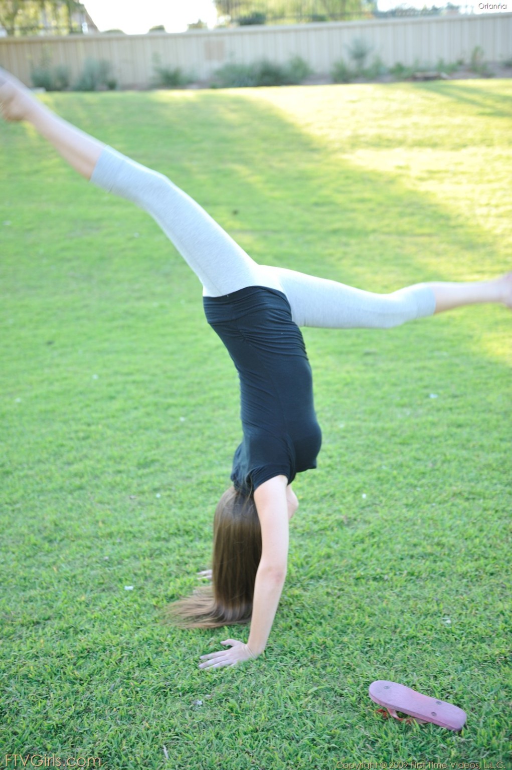 Teen Orianna plays in a public park #71497213