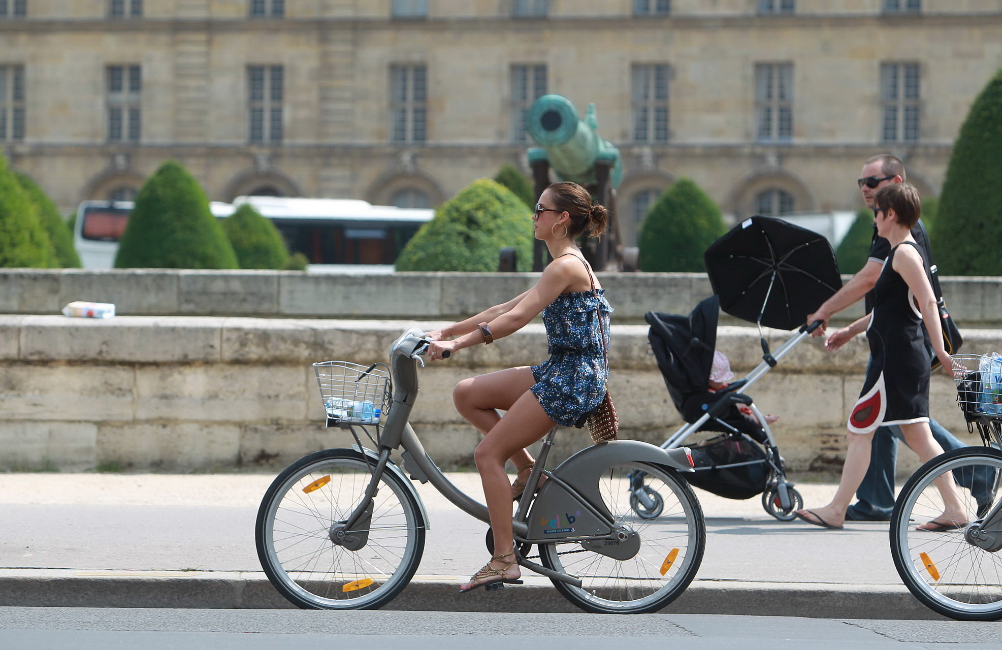 Jessica Alba leggy in Paris - riding a bike in mini dress #75343248
