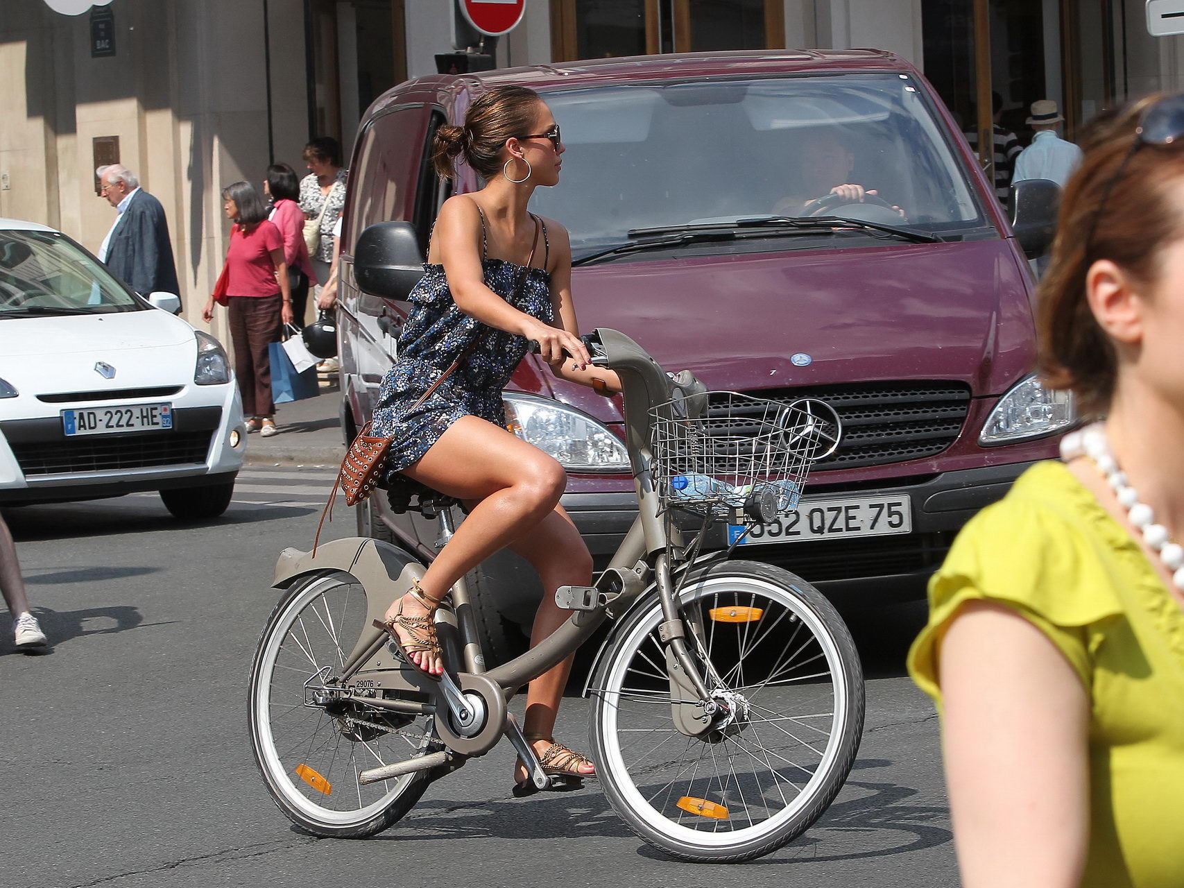 Jessica Alba leggy in Paris - riding a bike in mini dress #75343255