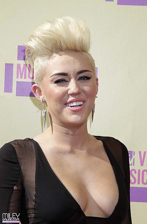 Miley Cyrus looking very sexy and huge cleavage photos #75252770