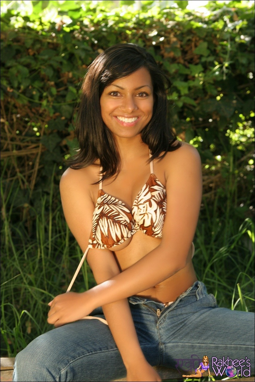 Sexy Indian teen in a bikini top and jeans #73190076