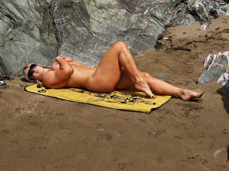 Hot female bodybuilder naked on the beach
 #70997449