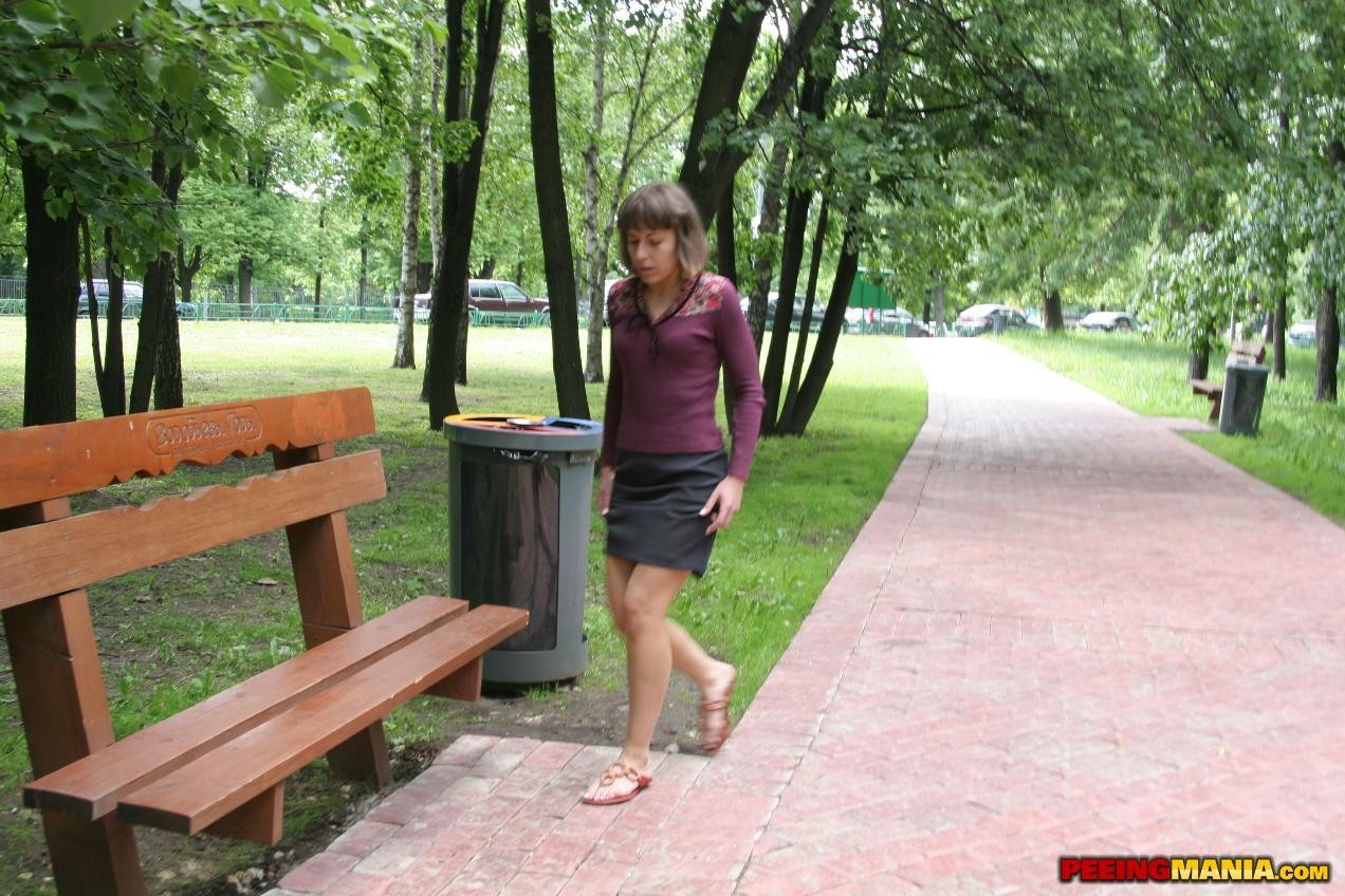 Explicit beige lace panties pissing on the bench in the public park #76518748