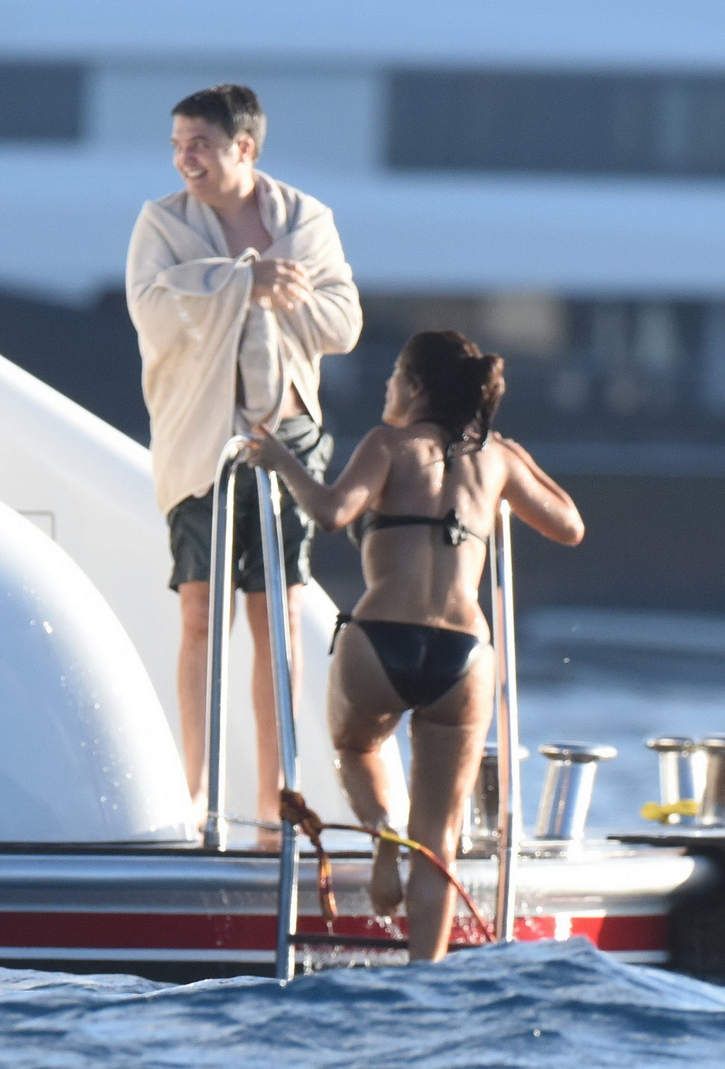Salma Hayek shows off her big boobs and ass in tiny black bikini at a yacht in S #75176966