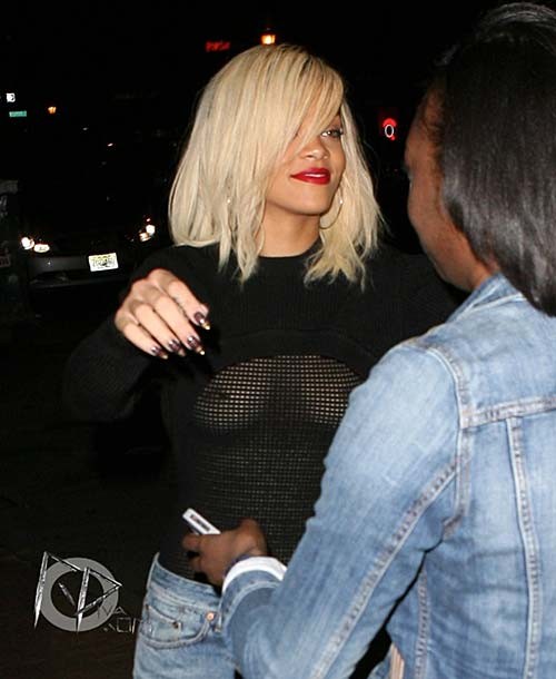 Rihanna walking down the street and showing hard nipples in see thru #75270639