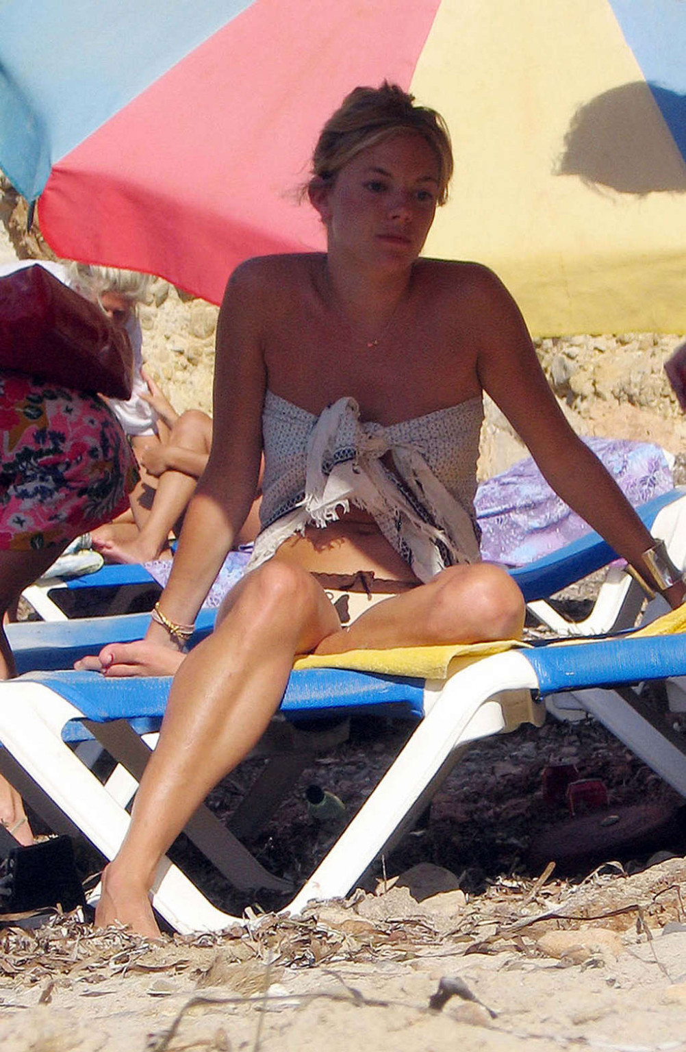 Sienna Miller revealing her nice big tits on beach paparazzi shoots and in movie #75351684