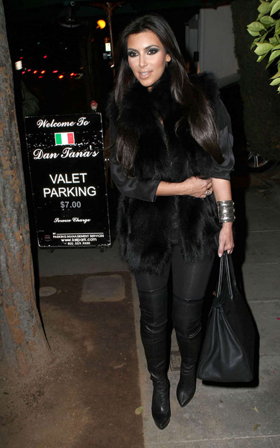 Kim Kardashian topless and all in black and high boots #75361386