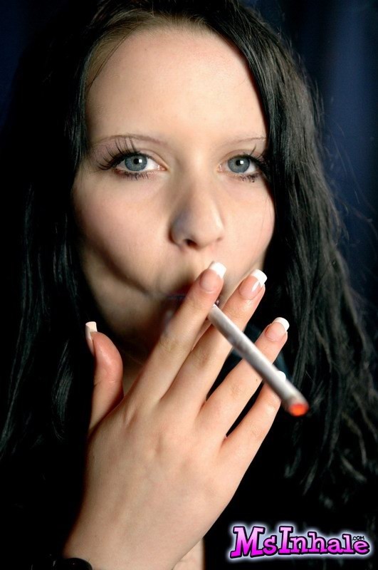 brunette teen smoking a cigarette #74982705