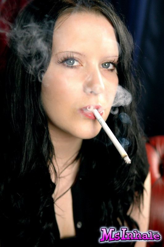brunette teen smoking a cigarette #74982756