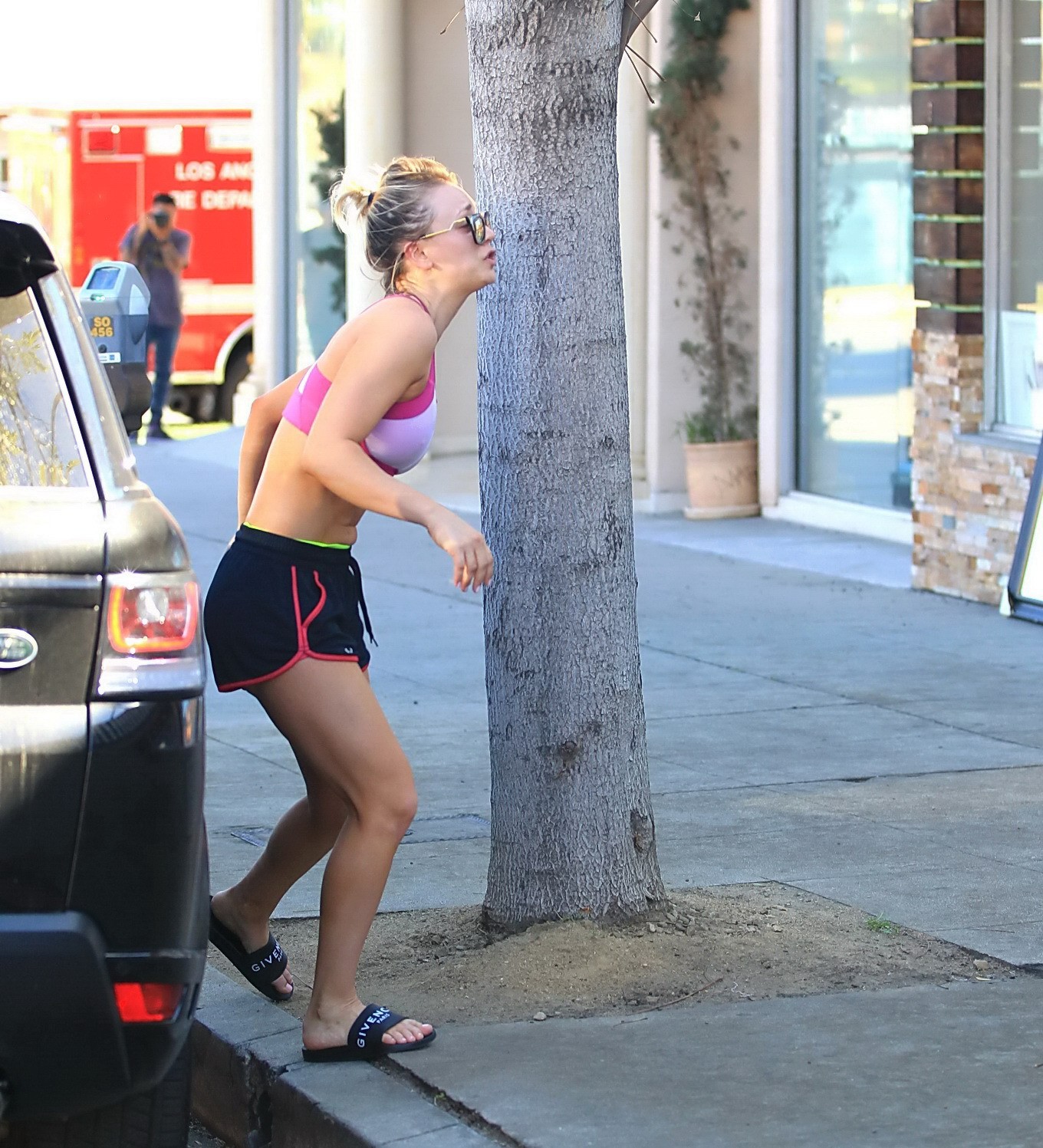 Kaley Cuoco showing pokies in a sports bra and shorts #75146133