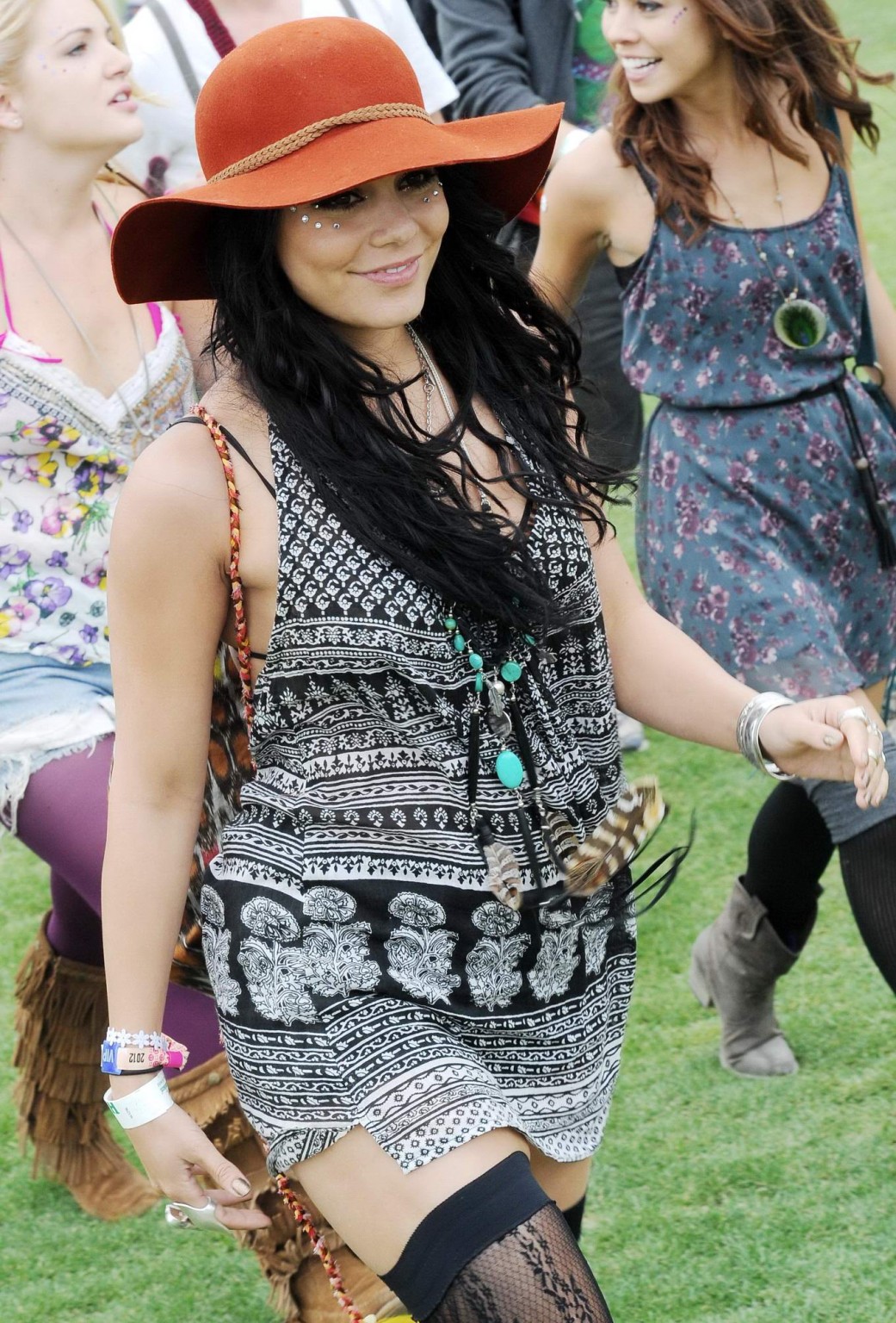 Vanessa Hudgens upskirt wearing a mini skirt  stockings at Coachella Music Festi #75266393