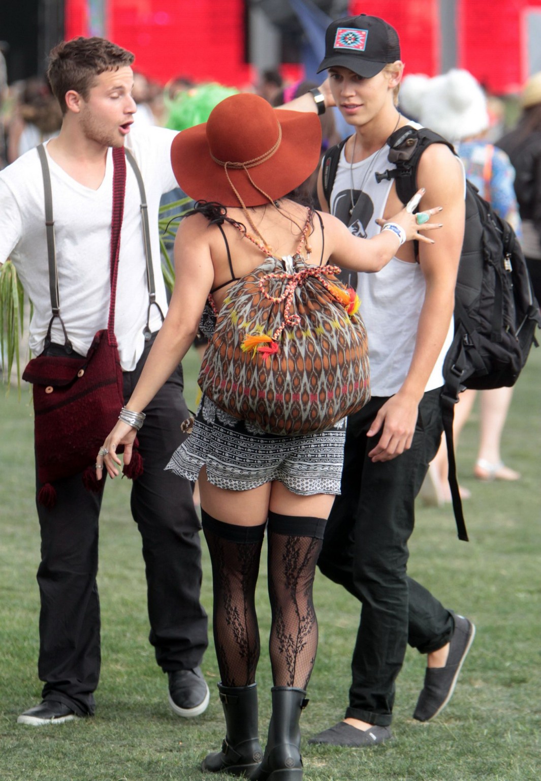 Vanessa Hudgens upskirt wearing a mini skirt  stockings at Coachella Music Festi #75266446
