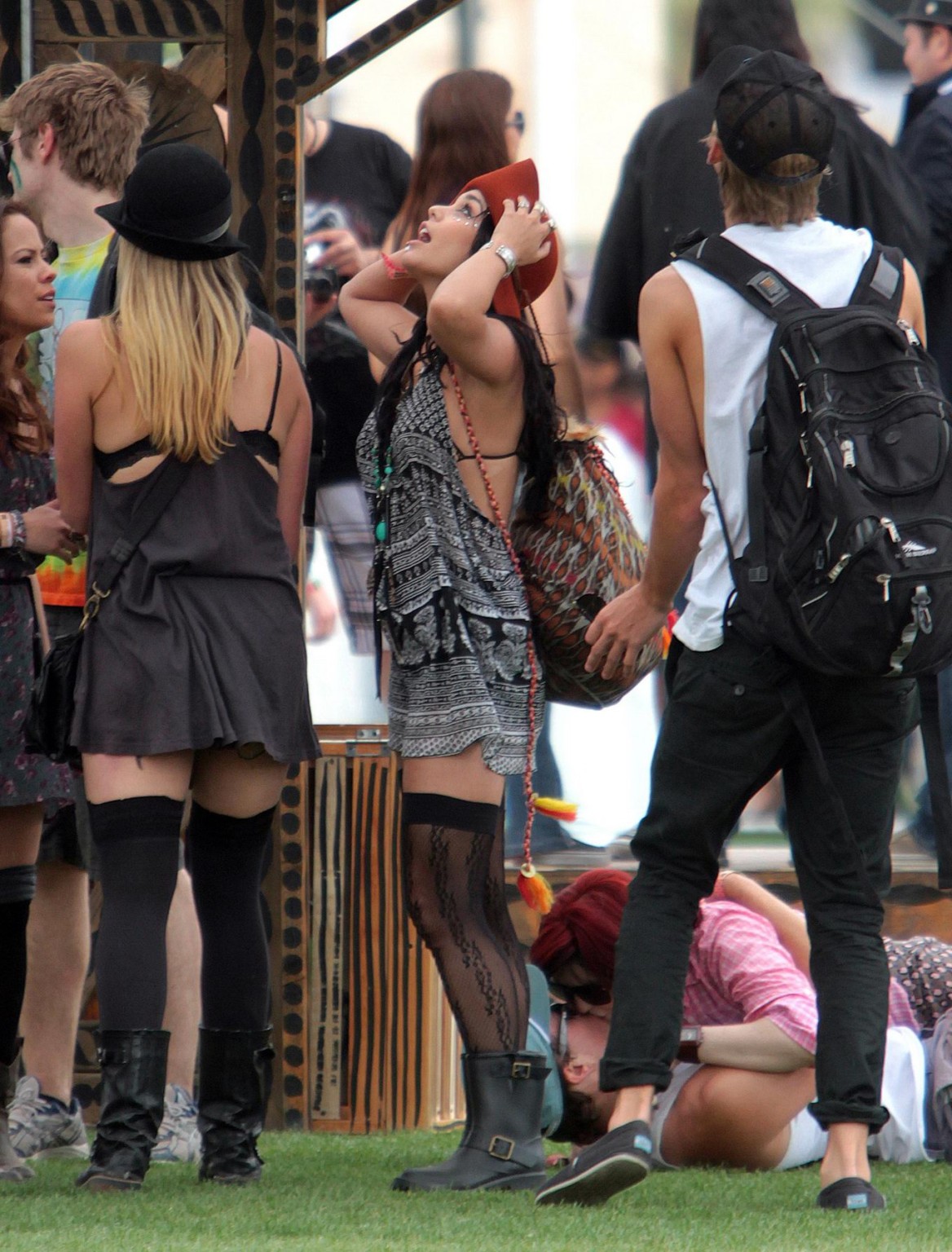 Vanessa Hudgens upskirt wearing a mini skirt  stockings at Coachella Music Festi #75266466