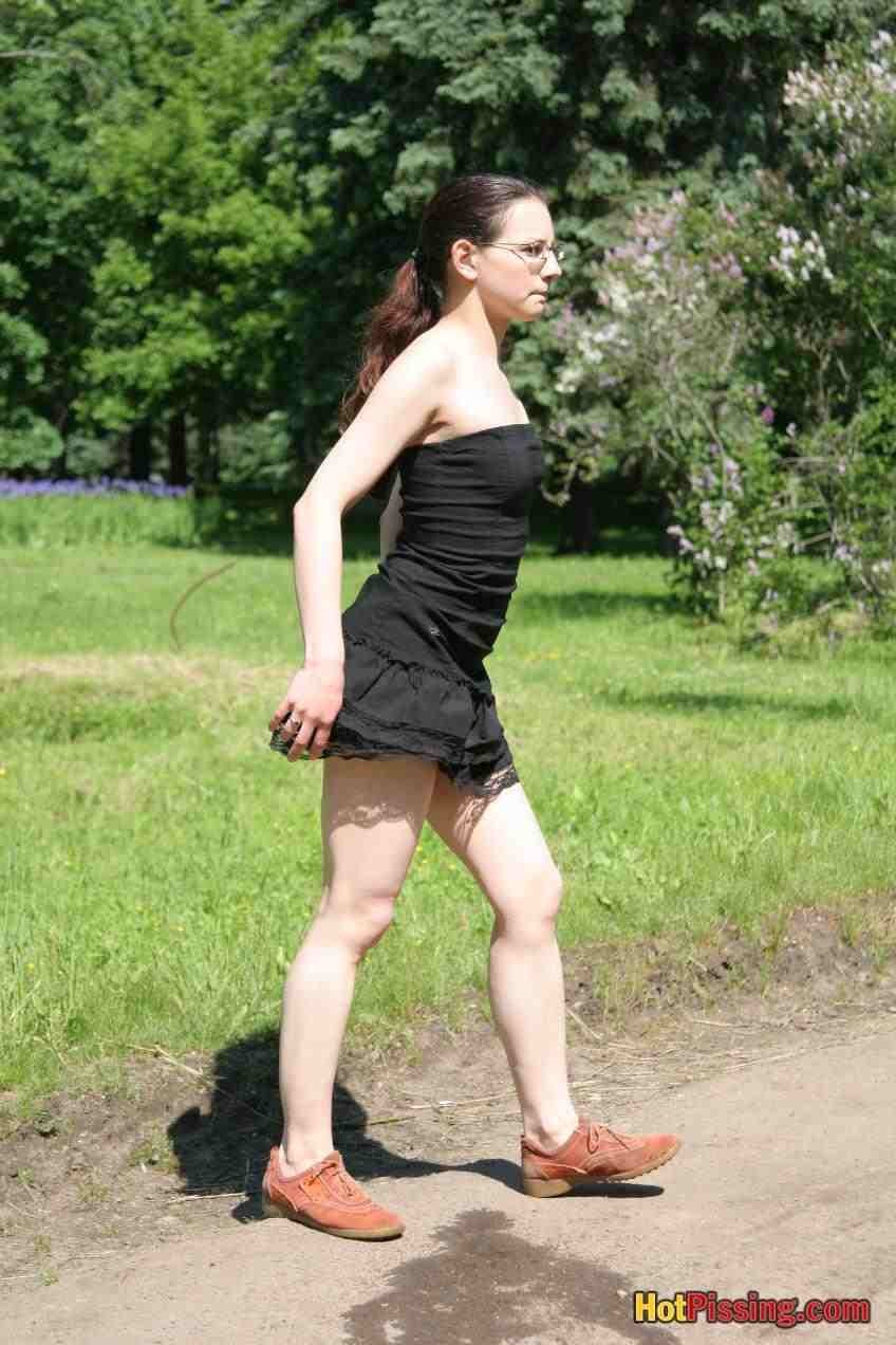Girl pissing outdoors #76526055