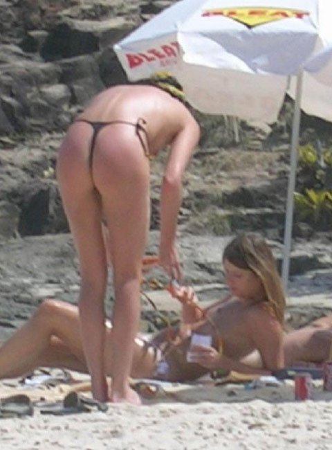Charlize Theron nude tits and sexy thongs on the beach #75422229