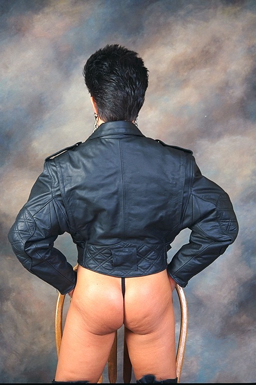 sexy brunette model in corsets posing #72225071