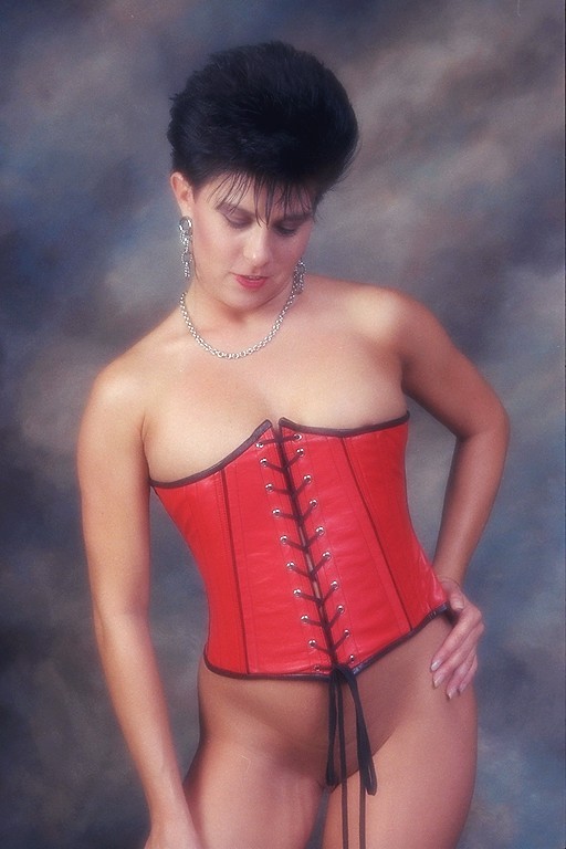 sexy brunette model in corsets posing #72225145
