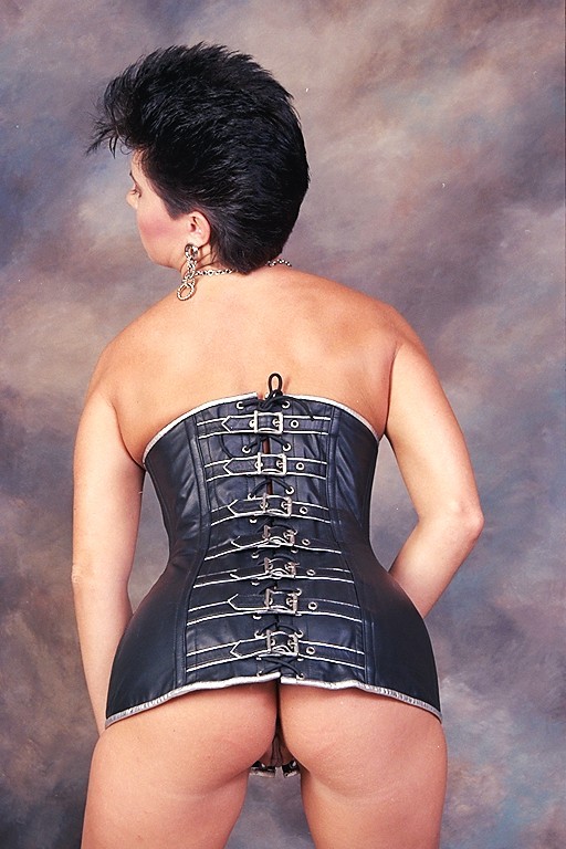 sexy brunette model in corsets posing #72225202