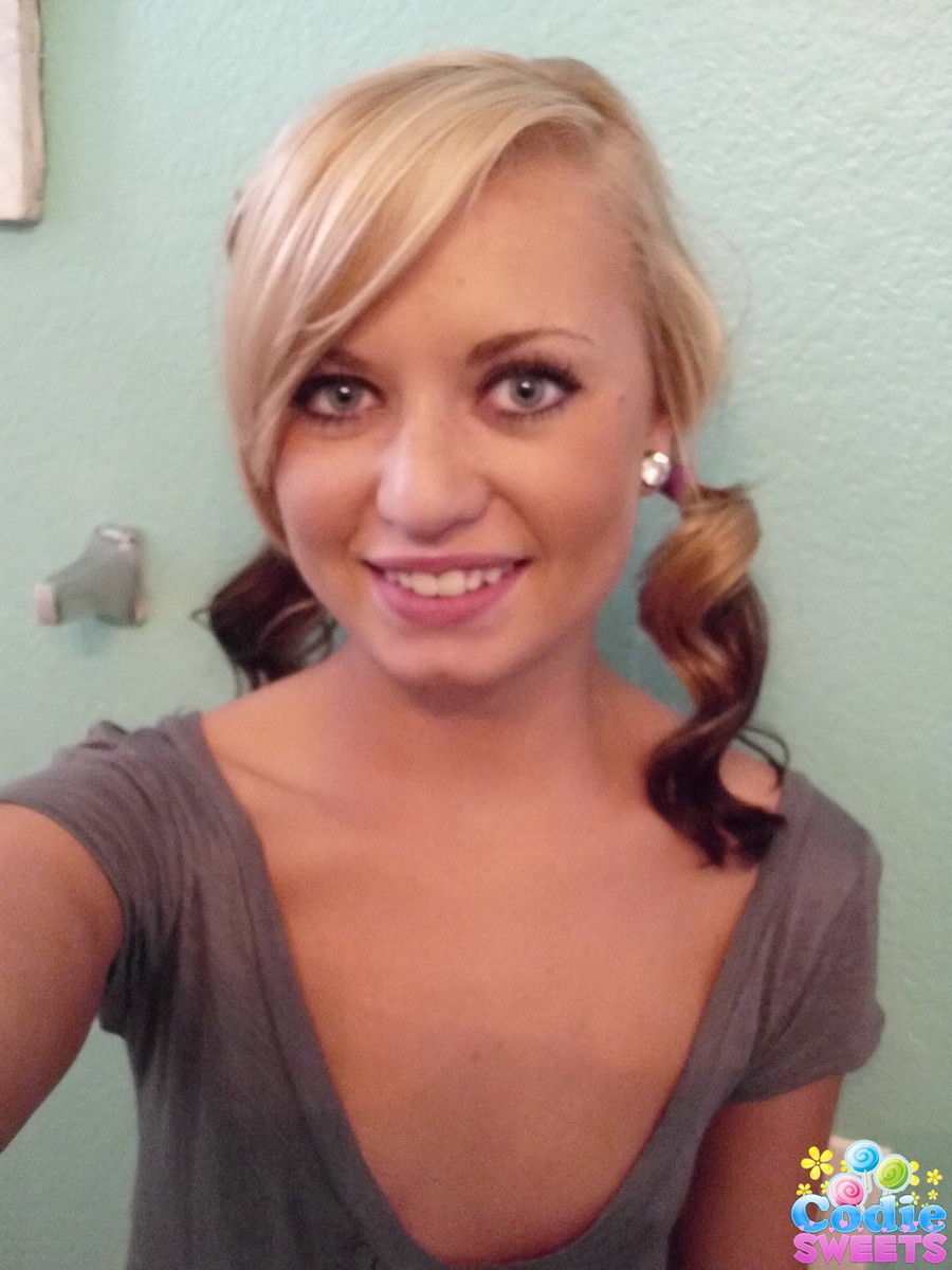 Perky blonde teen Codie Sweets takes selfshot pictures 
