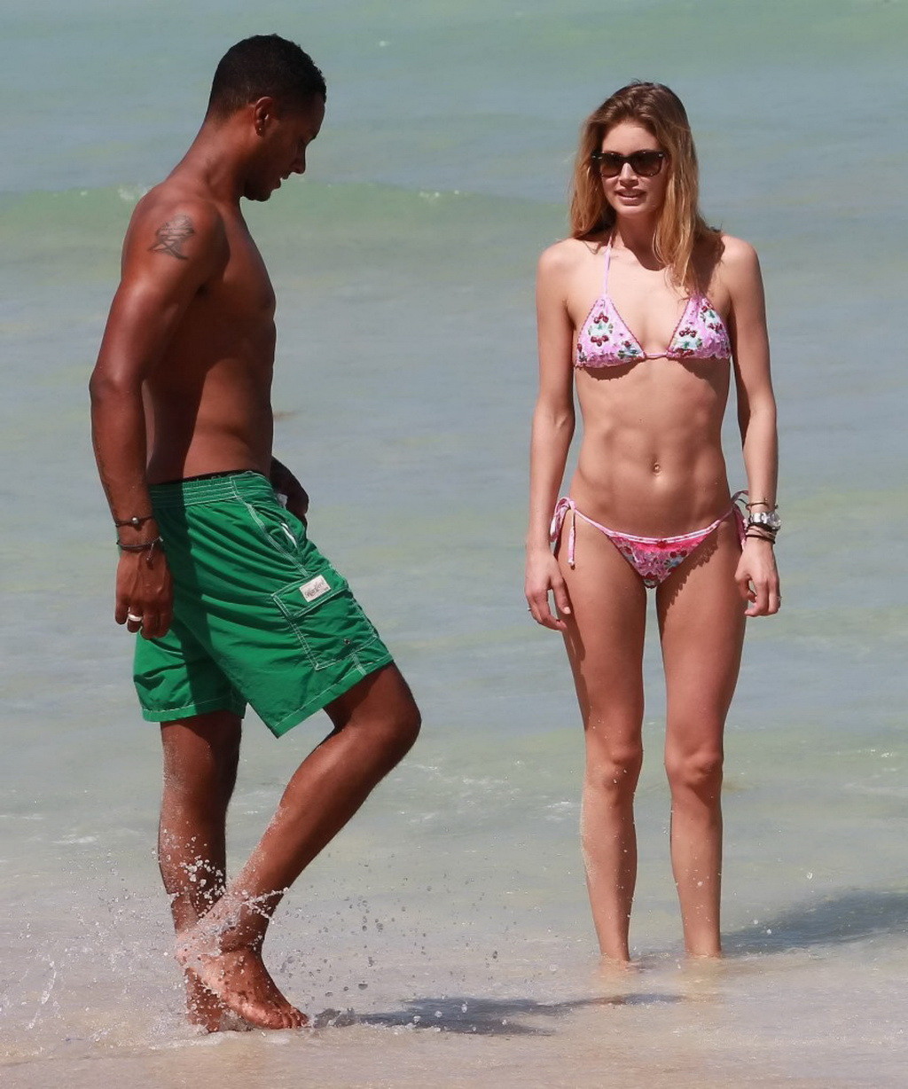 Doutzen Kroes wearing tiny pink bikini on the beach in Miami #75233819