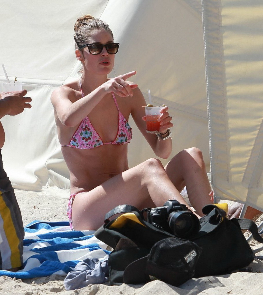 Doutzen Kroes wearing tiny pink bikini on the beach in Miami #75233848