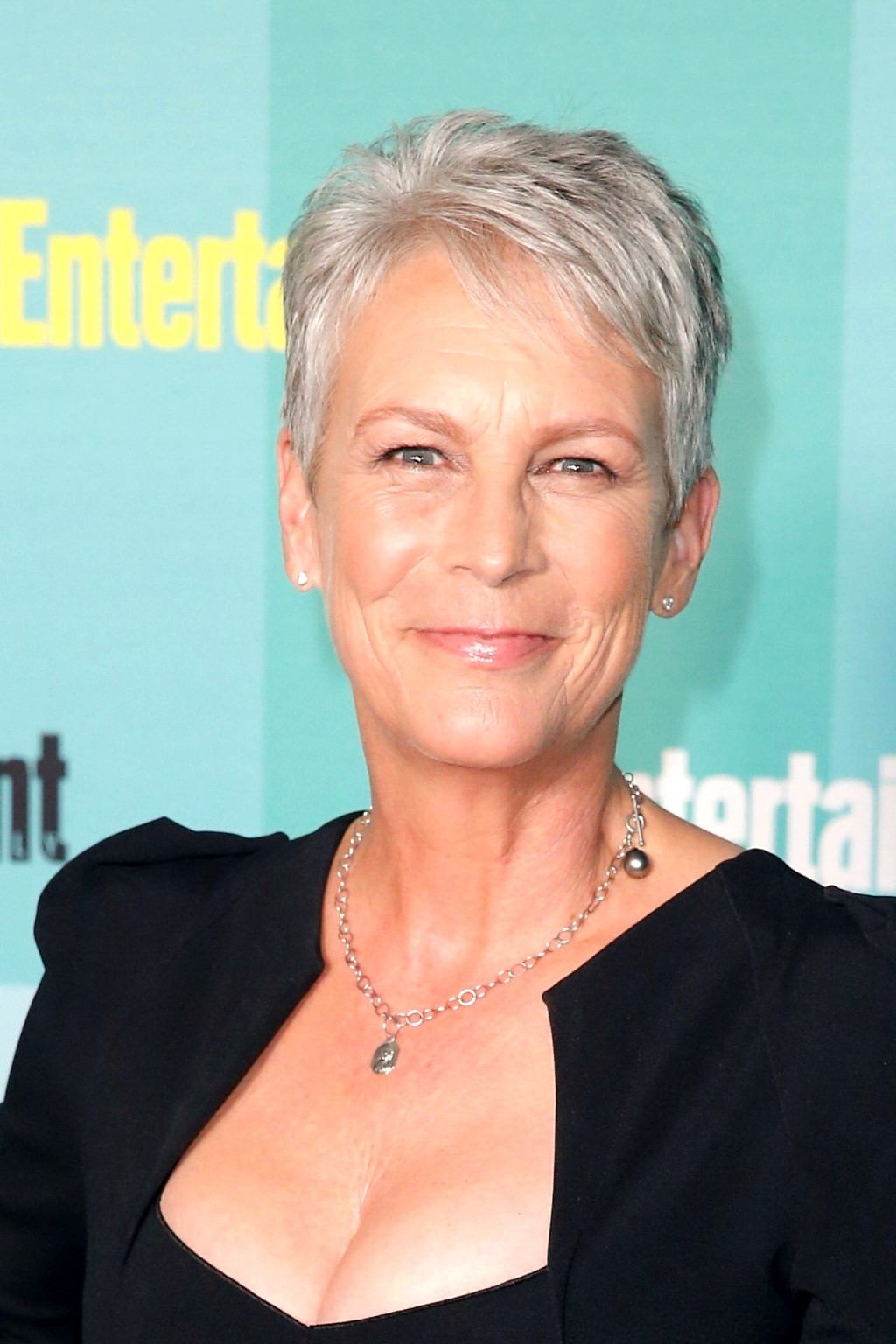 Jamie Lee Curtis shows cleavage wearing a low cut dress #75157610