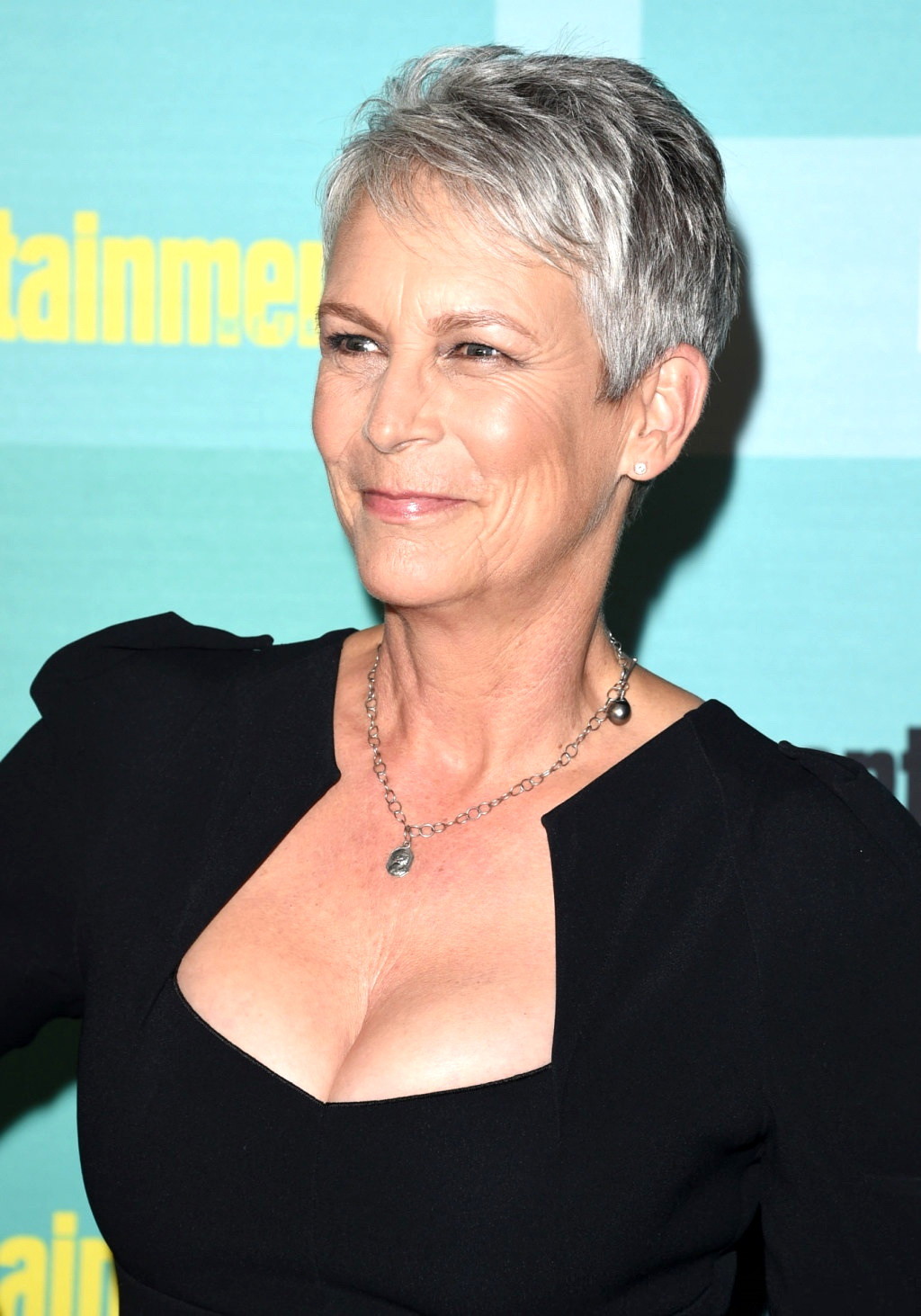 Jamie Lee Curtis shows cleavage wearing a low cut dress #75157655