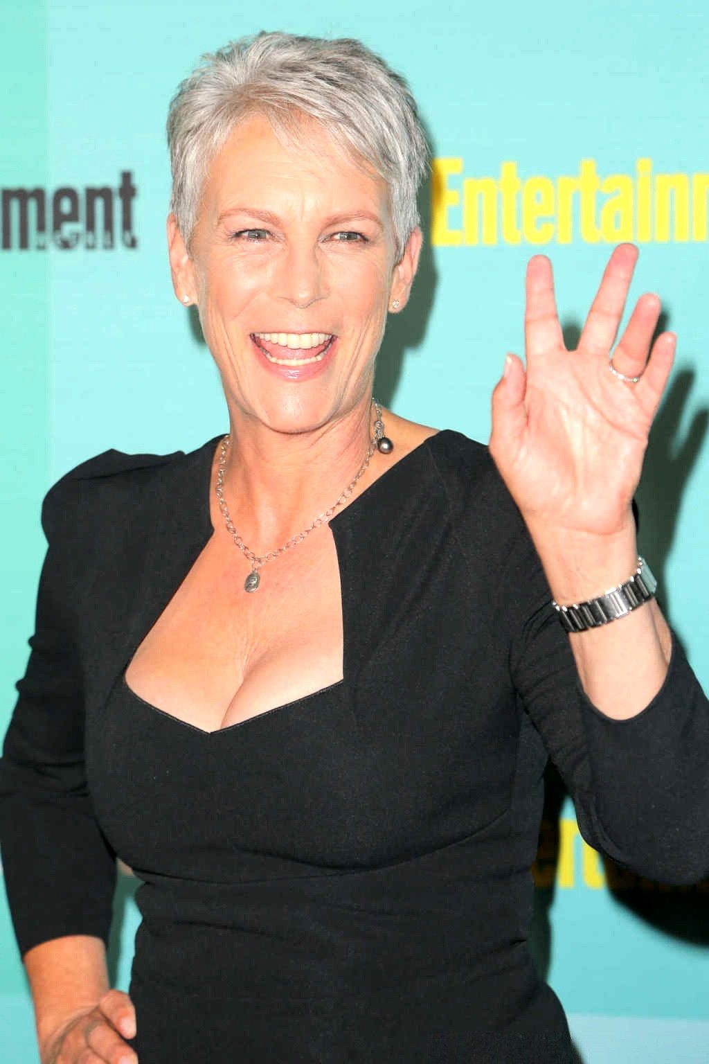 Jamie Lee Curtis shows cleavage wearing a low cut dress #75157668