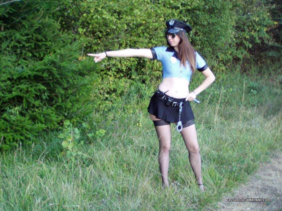 Sexy police woman posing #71588323
