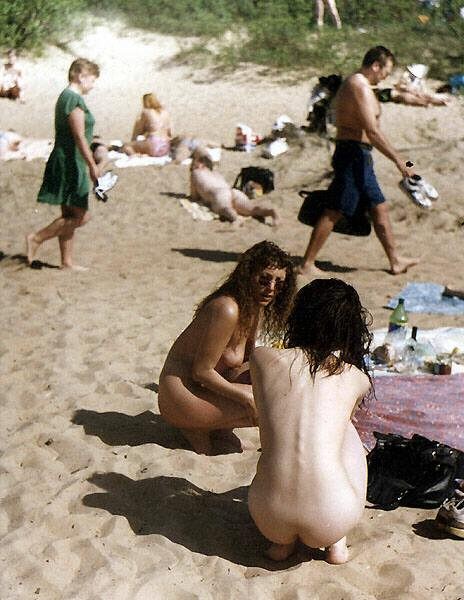 Hot Russian nudist strips her bikini off here #72253446