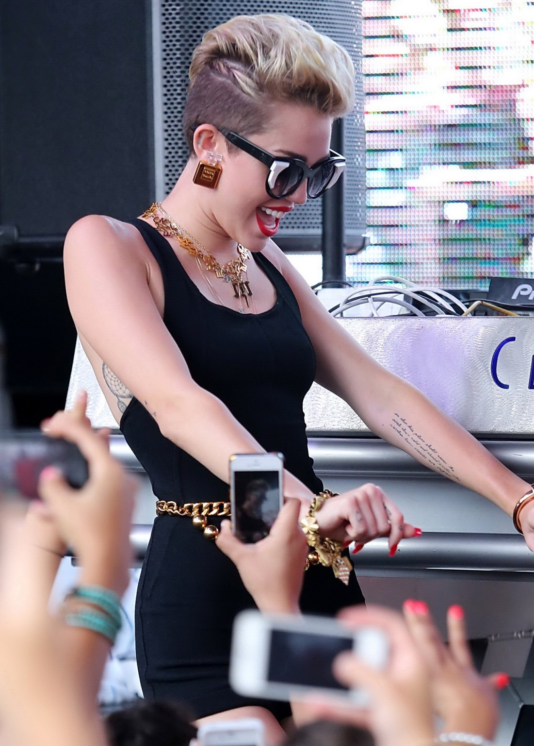 Miley Cyrus wearing tight black bodysuit at the Y100 Mack-A-Poolooza pool party  #75226887