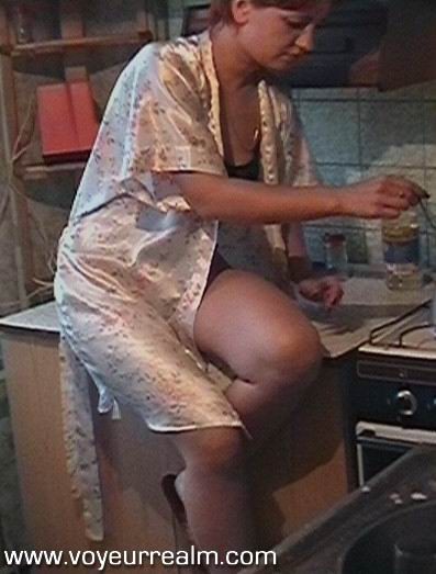 Amateur wife making coffee in the kitchen #79347536