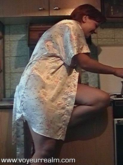 Amateur wife making coffee in the kitchen #79347575