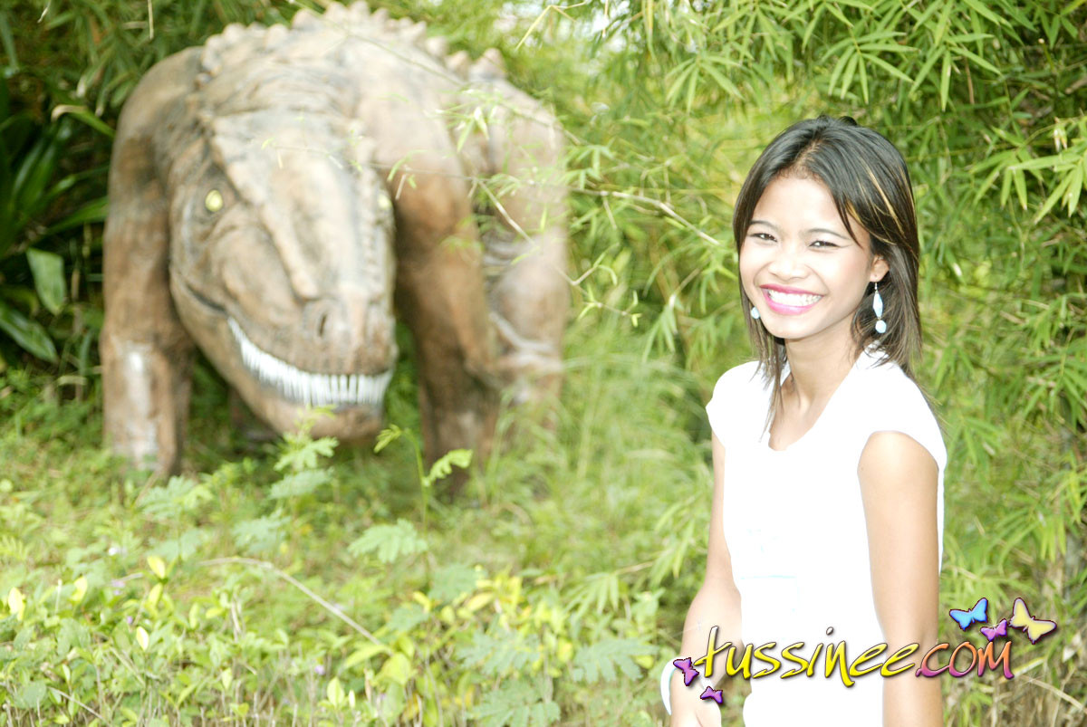 Asian Teen Tussinee doing some public flashing in a dinosaur park #69964027