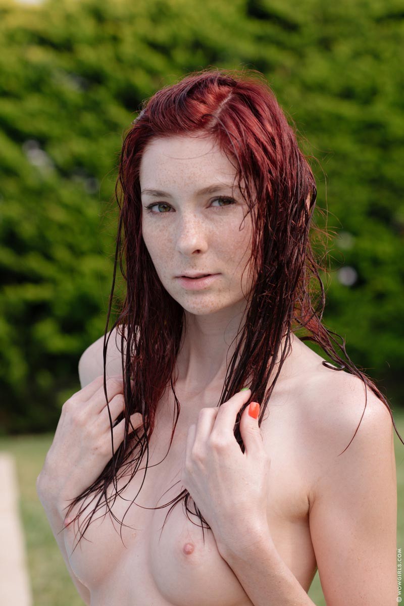 Hot busty redhead posing wet by the pool #72575491