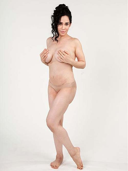 Nadya Suleman posing entirely nude and exhibiting enormous boobs