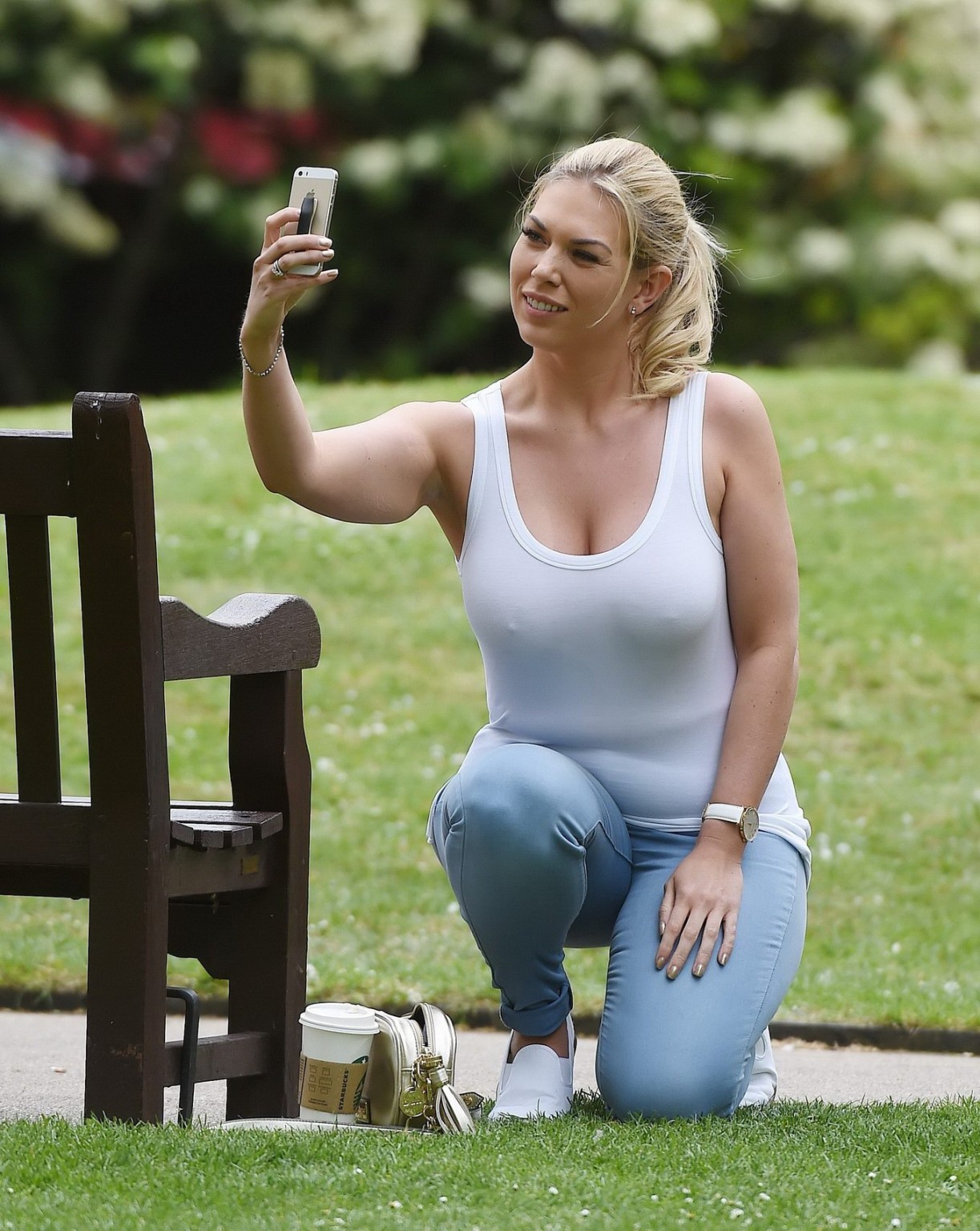 Busty Frankie Essex braless downblouse at a park in London #75162073
