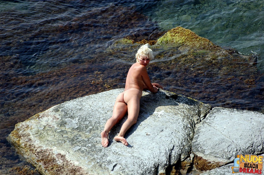 Blonde MILF caught totally naked on the beach #67309178