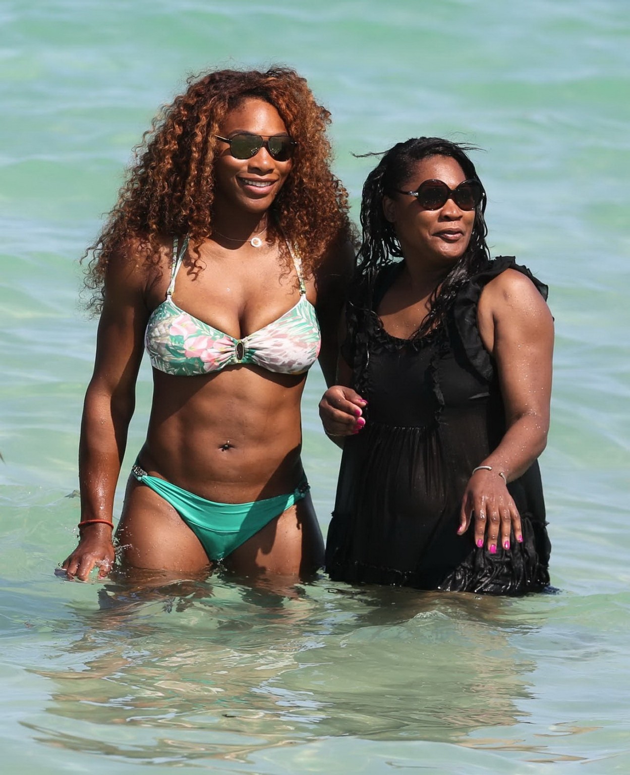 Serena Williams showing off her bikini curves at the beach in Miami