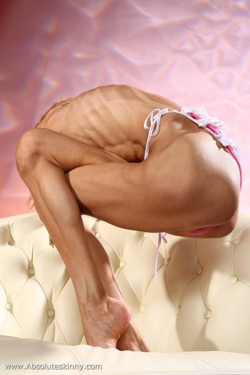 anorexic ballerina Inna on a white couch #70943788