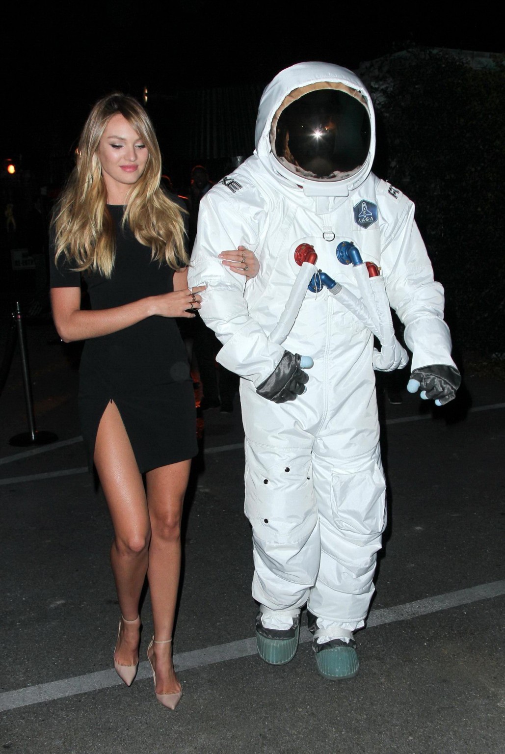 Candice Swanepoel panty peak wearing a high slit mini dress at the Rolling Stone #75241830