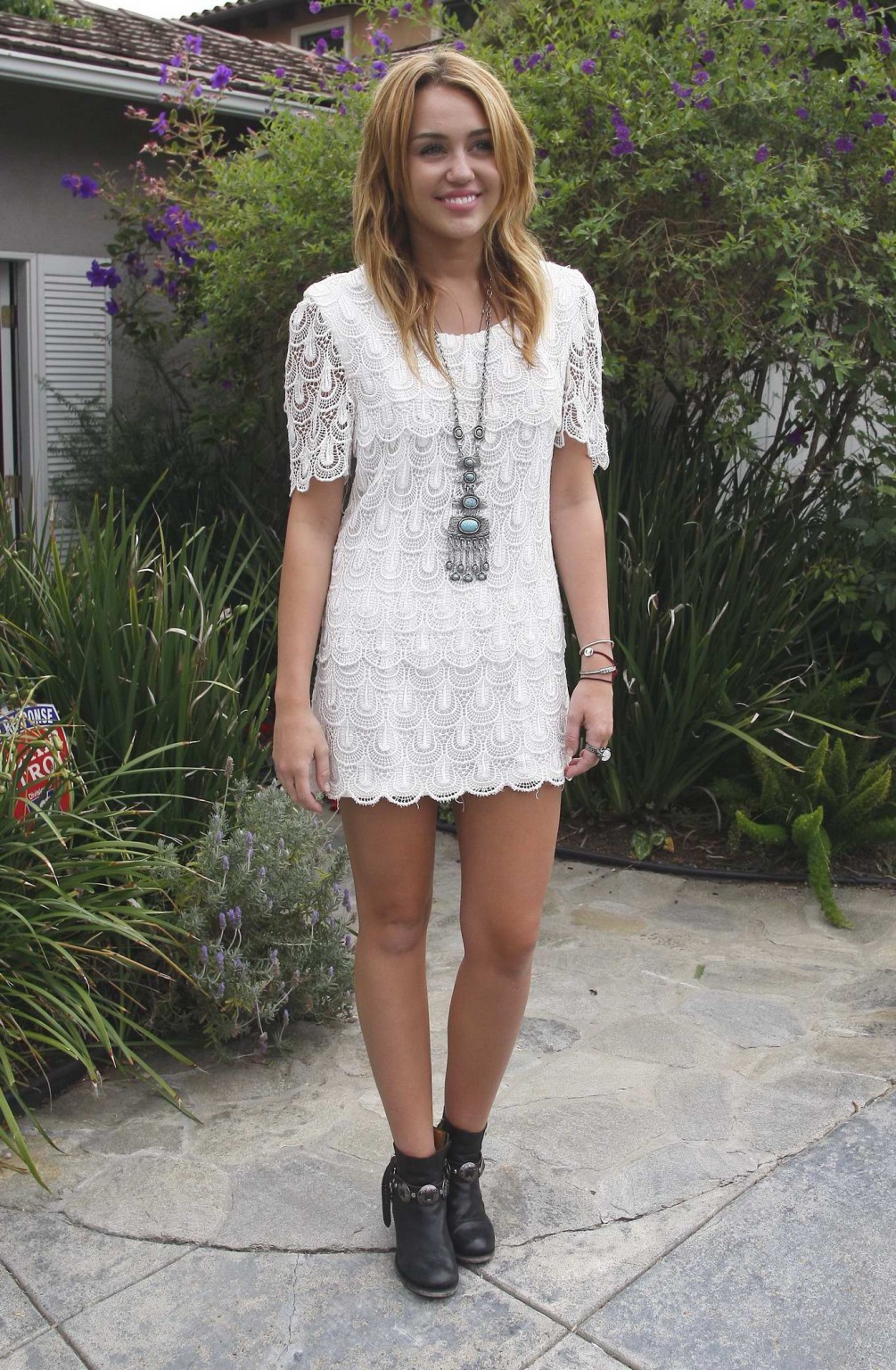 Miley Cyrus leggy wearing white mini dress at the house party #75289949