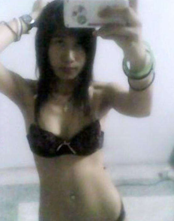 Posing in panties and a bra #69859542