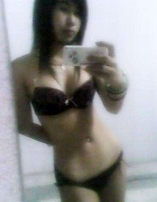 Posing in panties and a bra #69859559