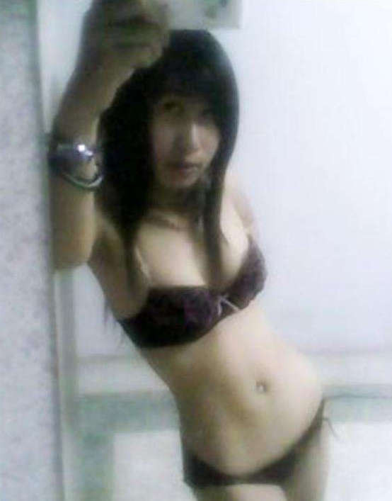 Posing in panties and a bra #69859571