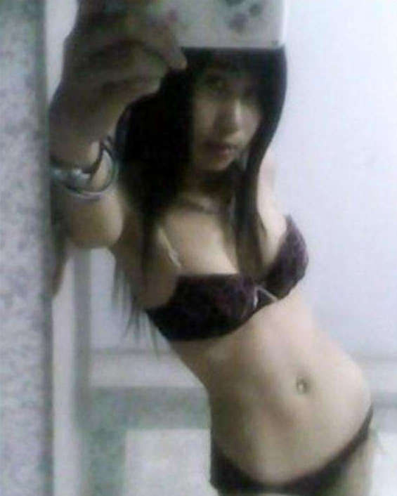 Posing in panties and a bra #69859576