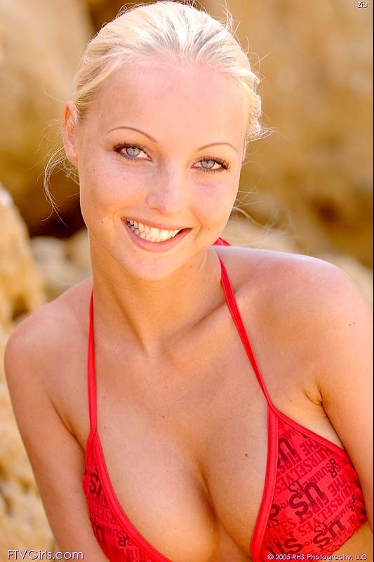 Beautiful beach blonde in red hot bikini #72319547