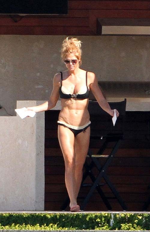 Torrie Wilson exposing sexy body and hot ass in bikini on pool #75276328