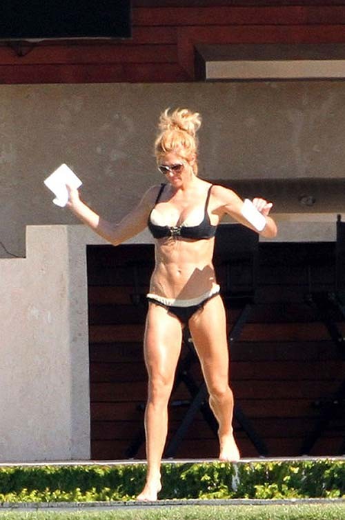 Torrie Wilson exposing sexy body and hot ass in bikini on pool #75276352